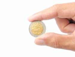 Uang Logam Rp1.000 Bergambar Kelapa Sawit Dijual Senilai Rp5 Miliar