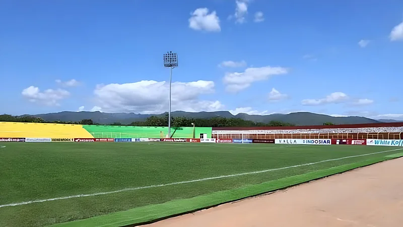 PSM Jamu Pemuncak Klasemen Arema Siang Ini, Misi Bangkit Juku Eja Lapangan Stadion Gelora BJ Habibie dengan tribun berwarna kuning dan hijau di bawah langit cerah